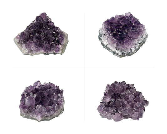 Set kleiner violetter Amethyst Stufen auf weißem Hintergrund
