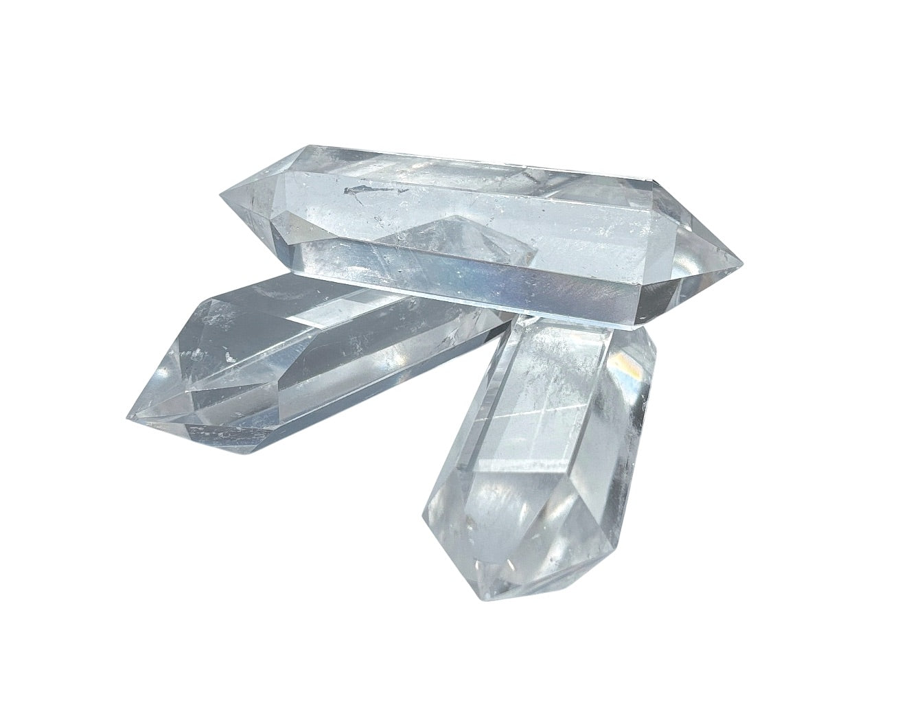 3er-Set Bergkristall Doppelender übereinander angeordnet auf weißem Hintergrund