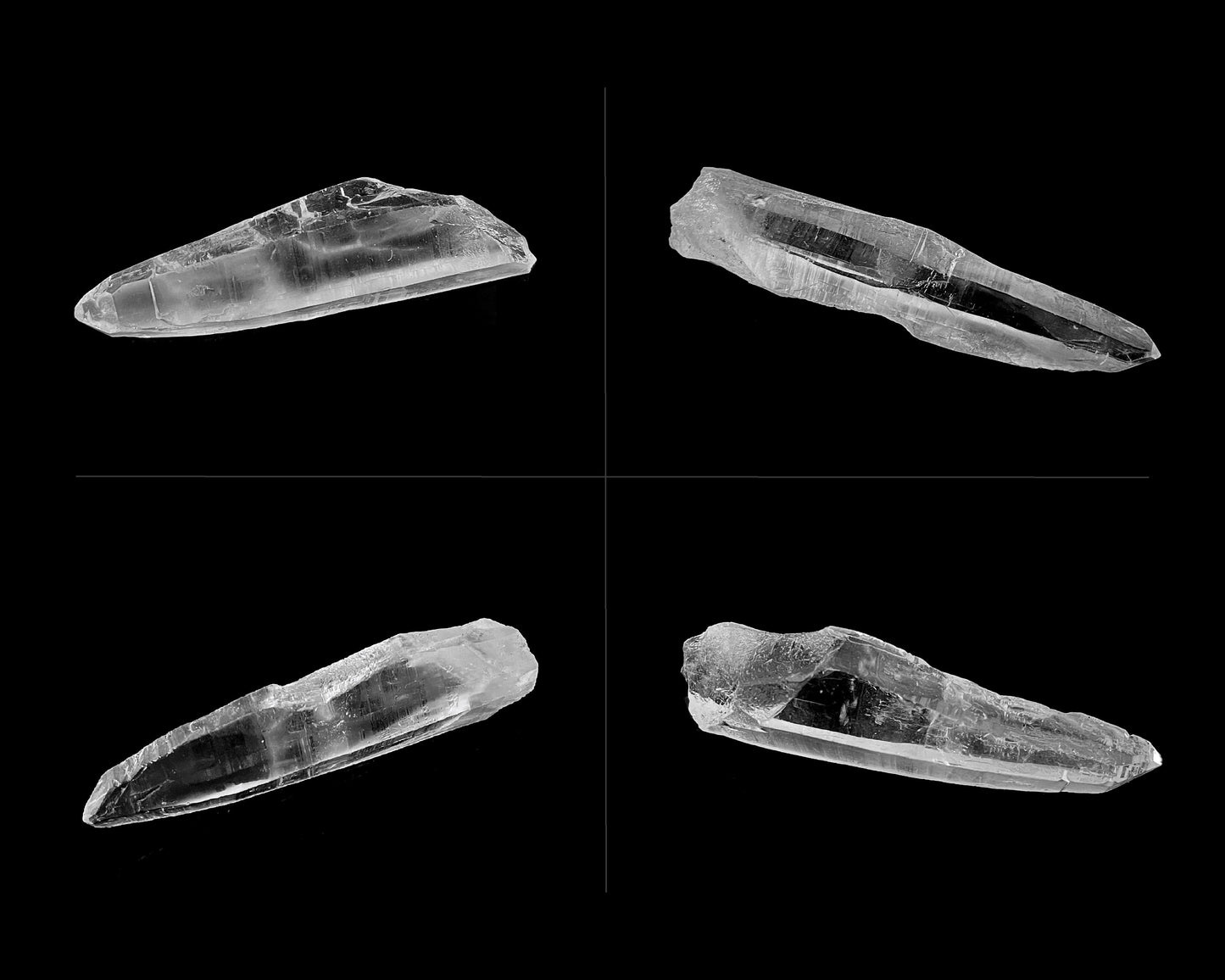 Bergkristall Laserquarz zweireihig nebeneinander angeordnet auf schwarzen Hintergrund