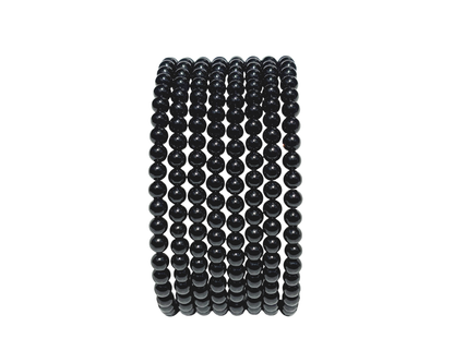 Längsansicht: schwarzes Onyx Armband mit runden Kugeln auf weißem Hintergrund