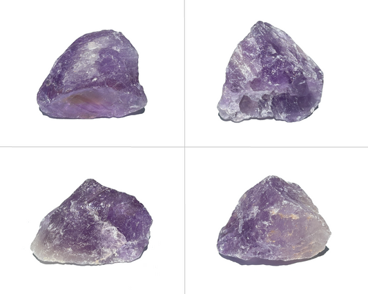 Amethyst Rohsteine nebeneinander und untereinander angeordnet auf weißem Hintergrund