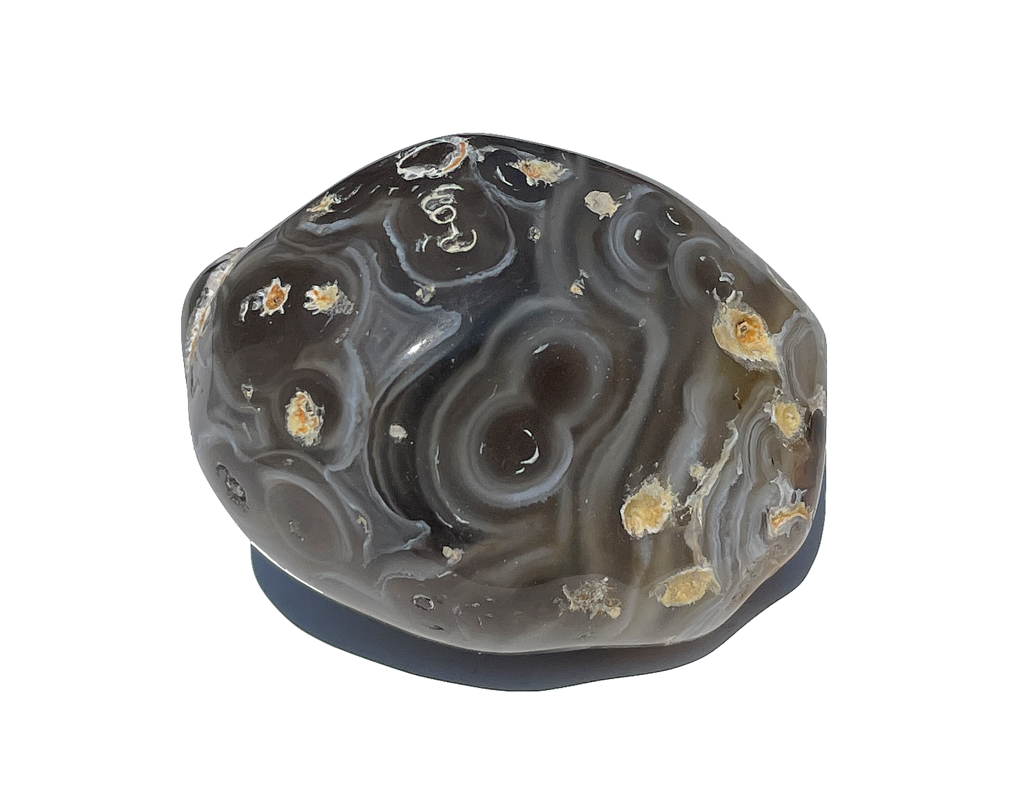 dunkler Wasserachat mit Maserung auf weißem Hintergrund