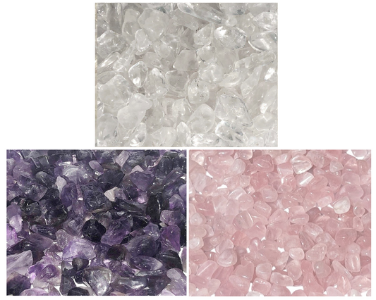 Amethyst Bergkristall Rosenquarz Trommelsteine nebeneinander auf weißem Hintergrund