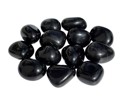 Vorderansicht: Onyx Trommelsteine auf weißem Hintergrund